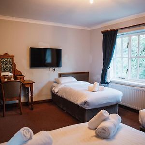 Chambre Familiale Lit Queen-Size avec Accès aux Personnes Handicapées